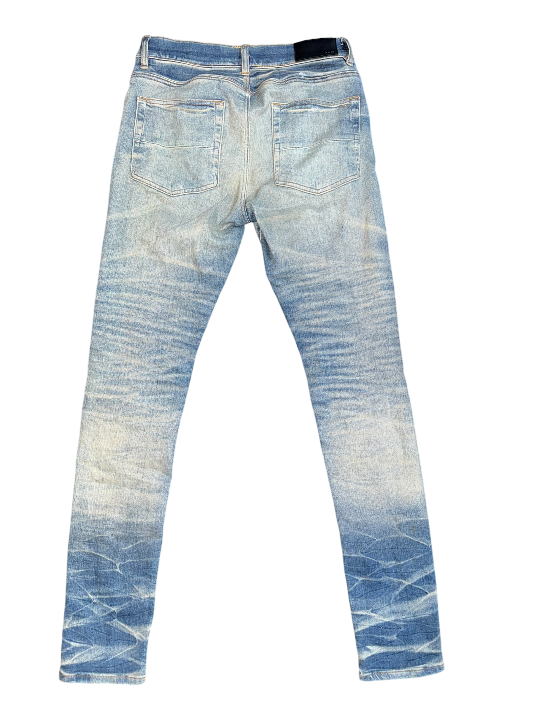 Amiri MX1 Light Wash Boucle Patch Jeans