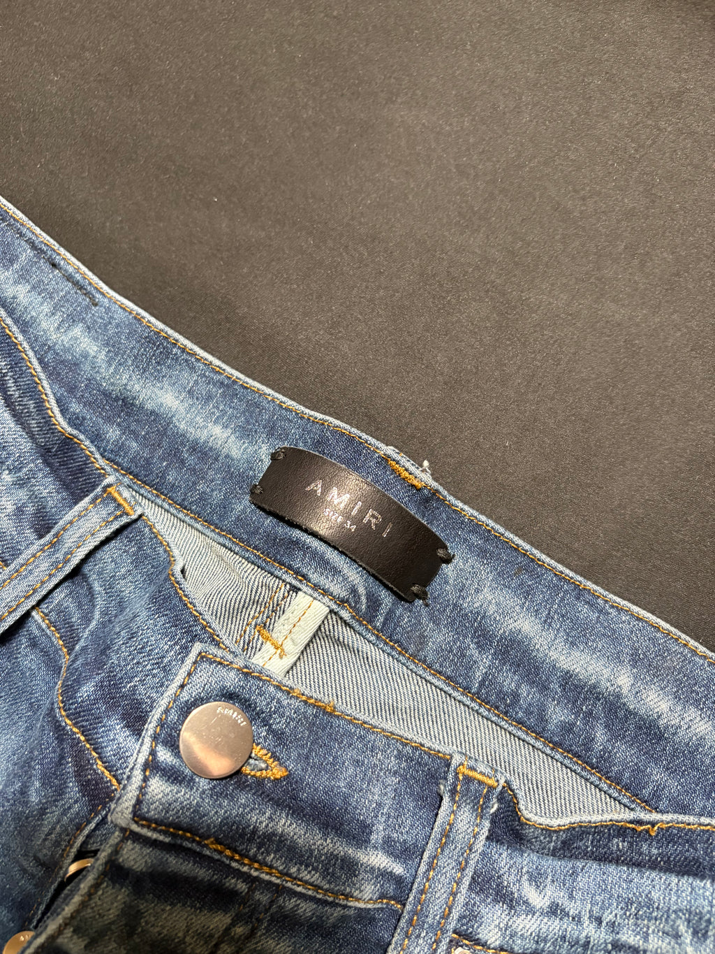 Amiri MX1 LightWash Black Patch Jeans