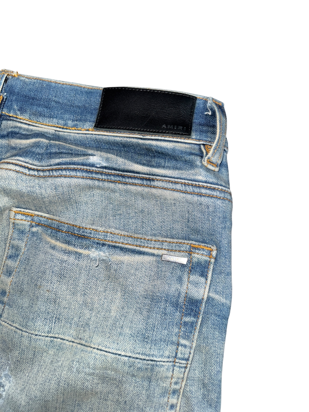 Amiri MX1 Light Wash Boucle Patch Jeans