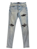 Amiri MX1 Light Wash Black Patch Jeans