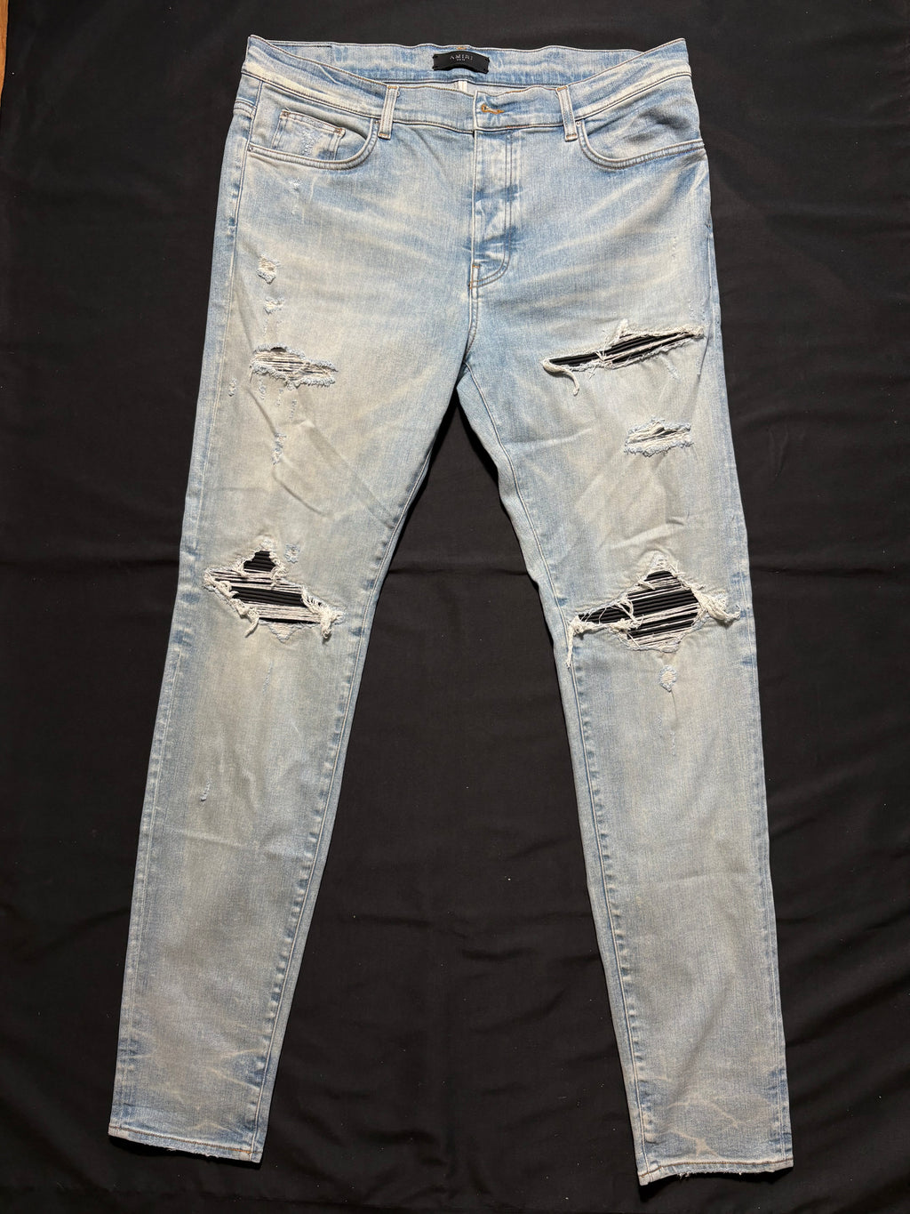 Amiri MX1 Jeans Light Wash Black Patch