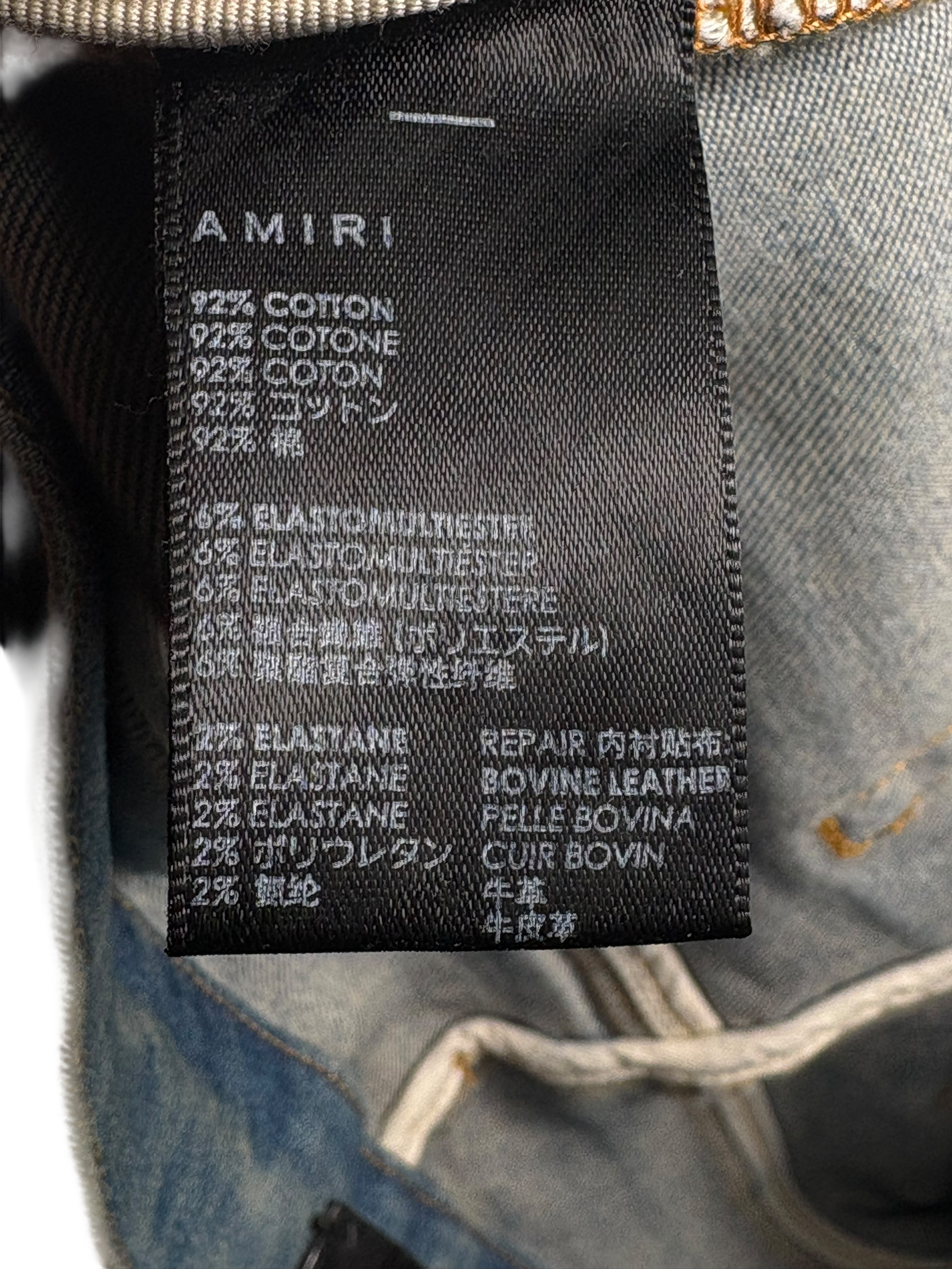 Amiri MX1 LightWash Orange Crackle Patch Jeans