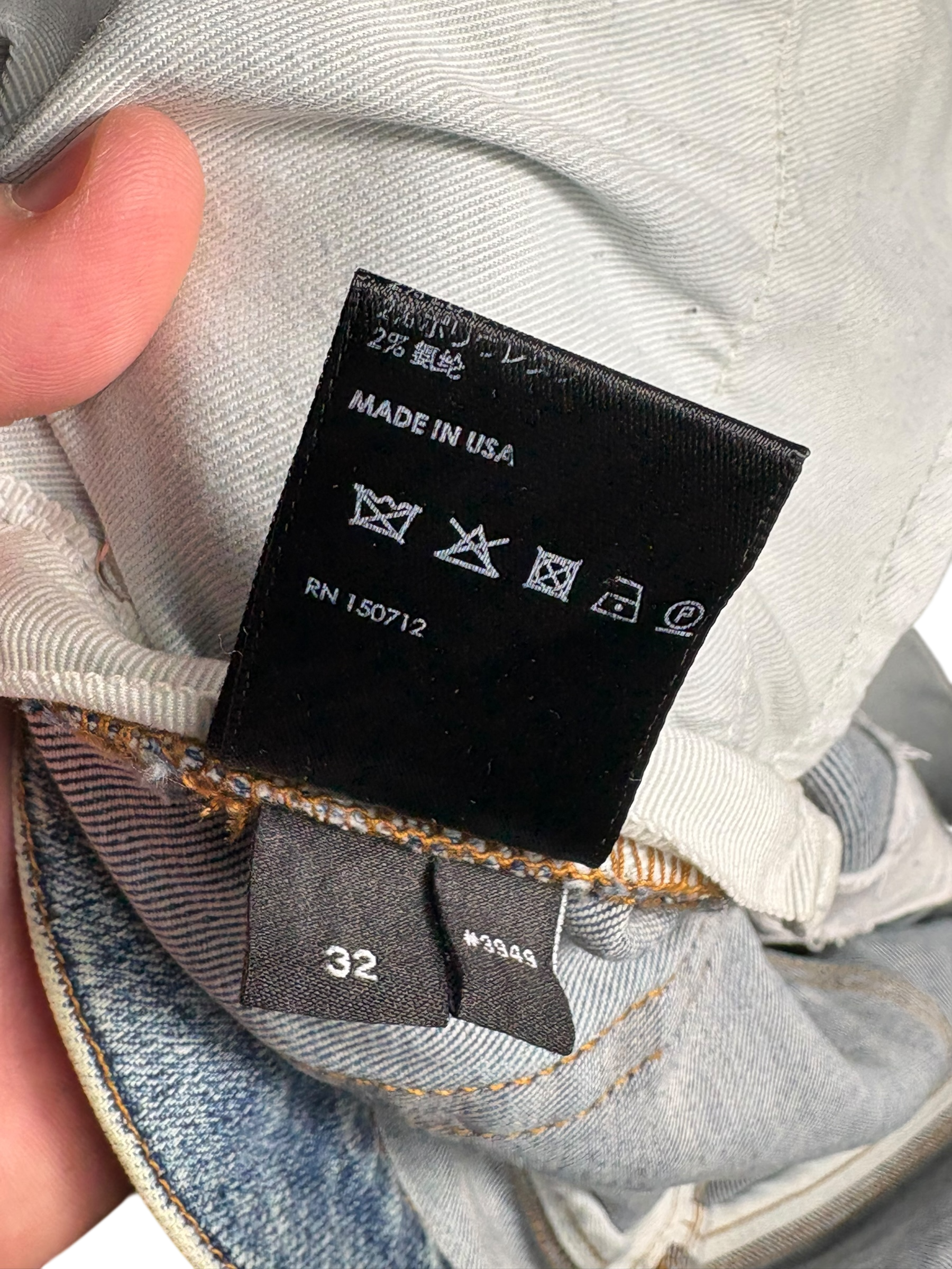 Amiri Pink Side Logo Light Wash Blue Jeans
