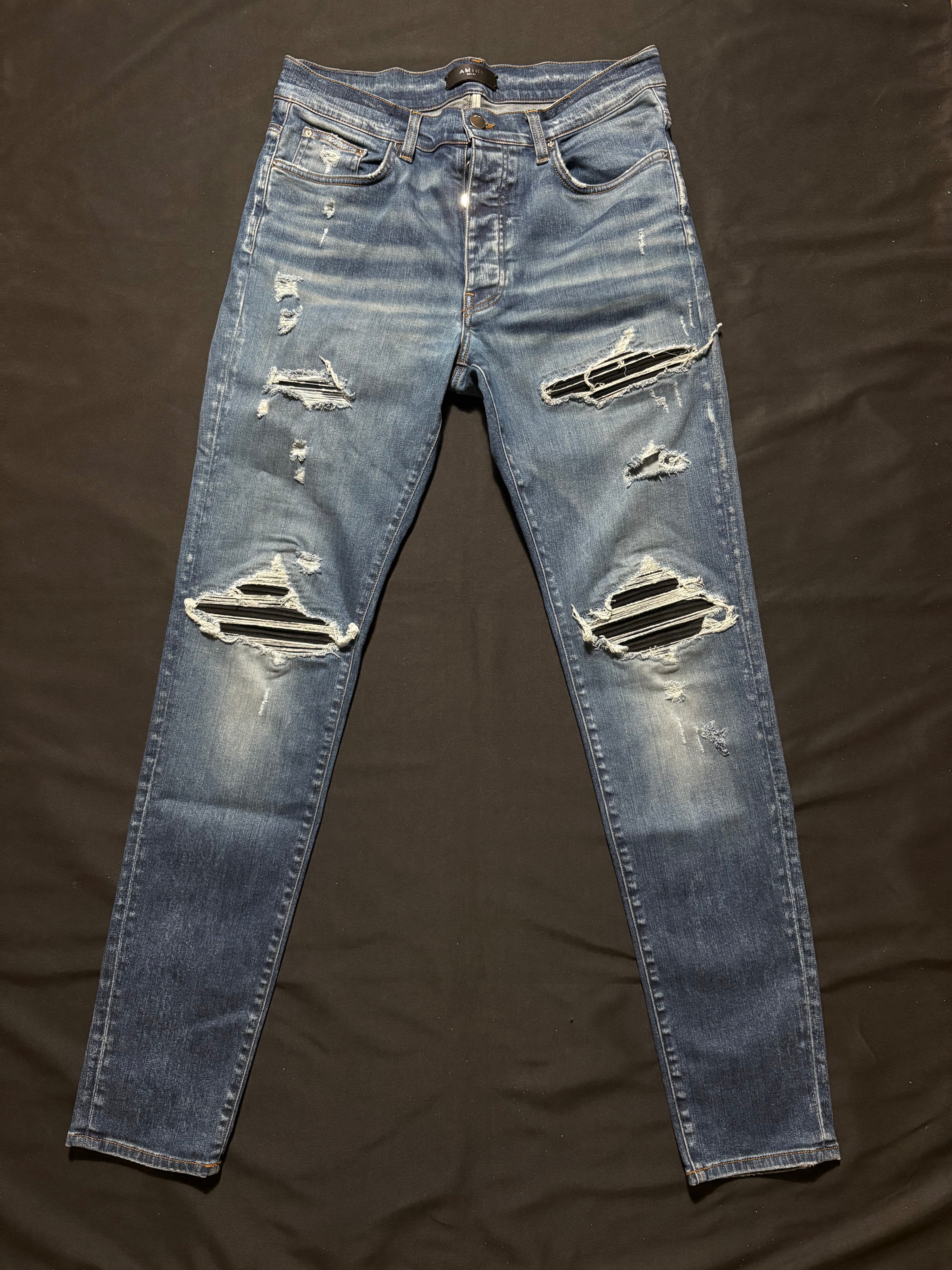 Amiri MX1 LightWash Black Patch Jeans