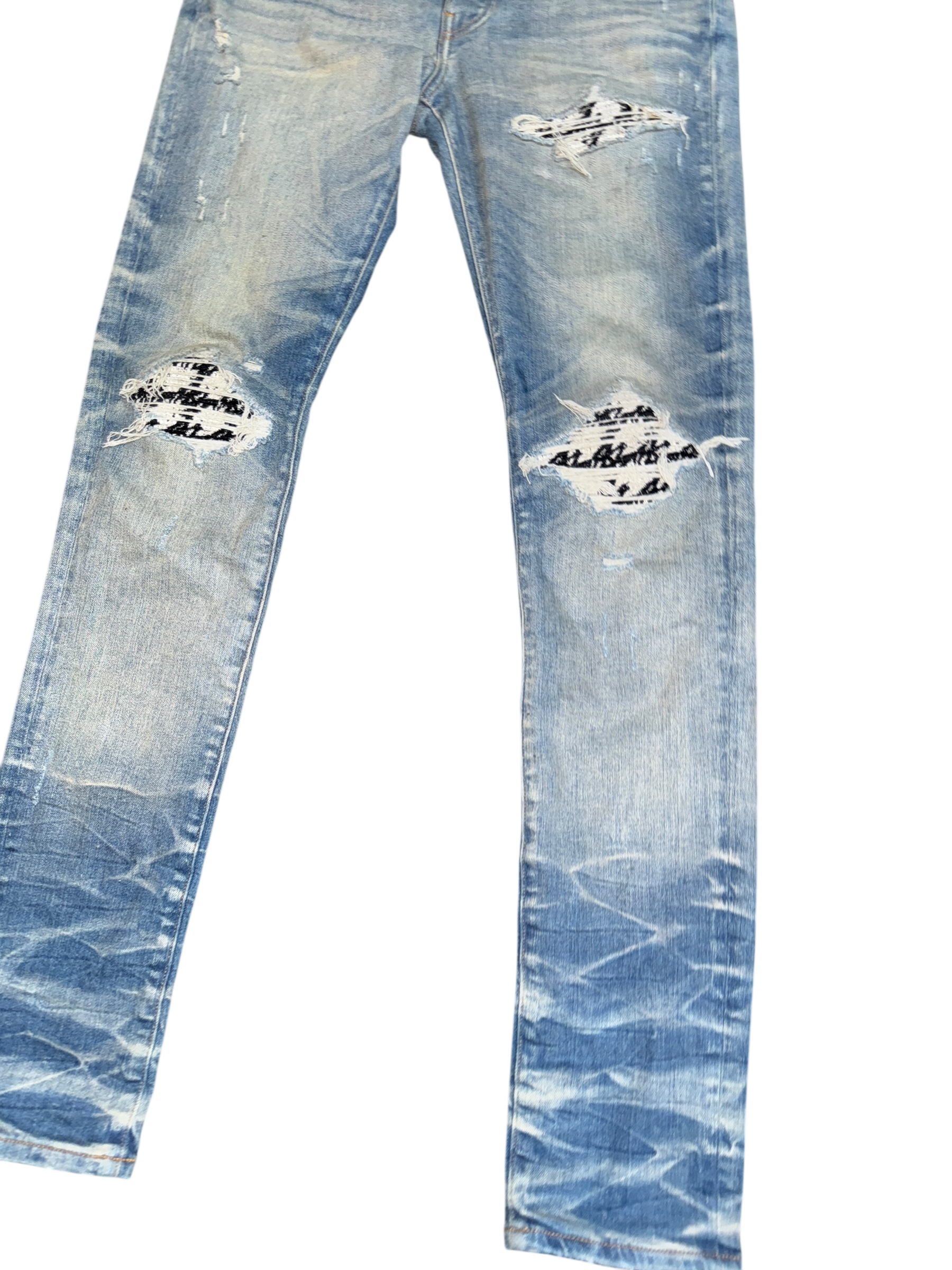 Amiri MX1 Light Wash Boucle Patch Jeans