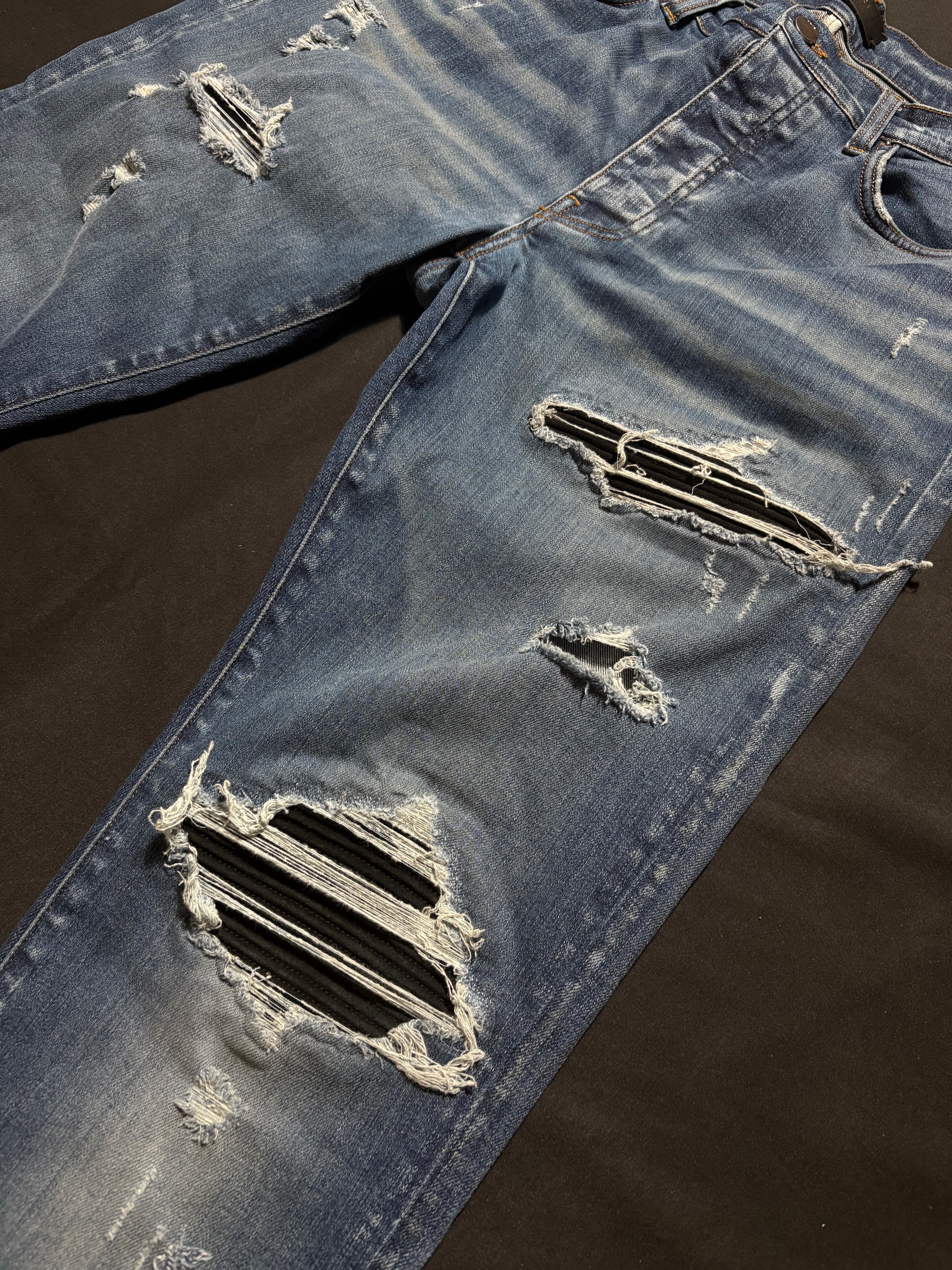 Amiri MX1 LightWash Black Patch Jeans