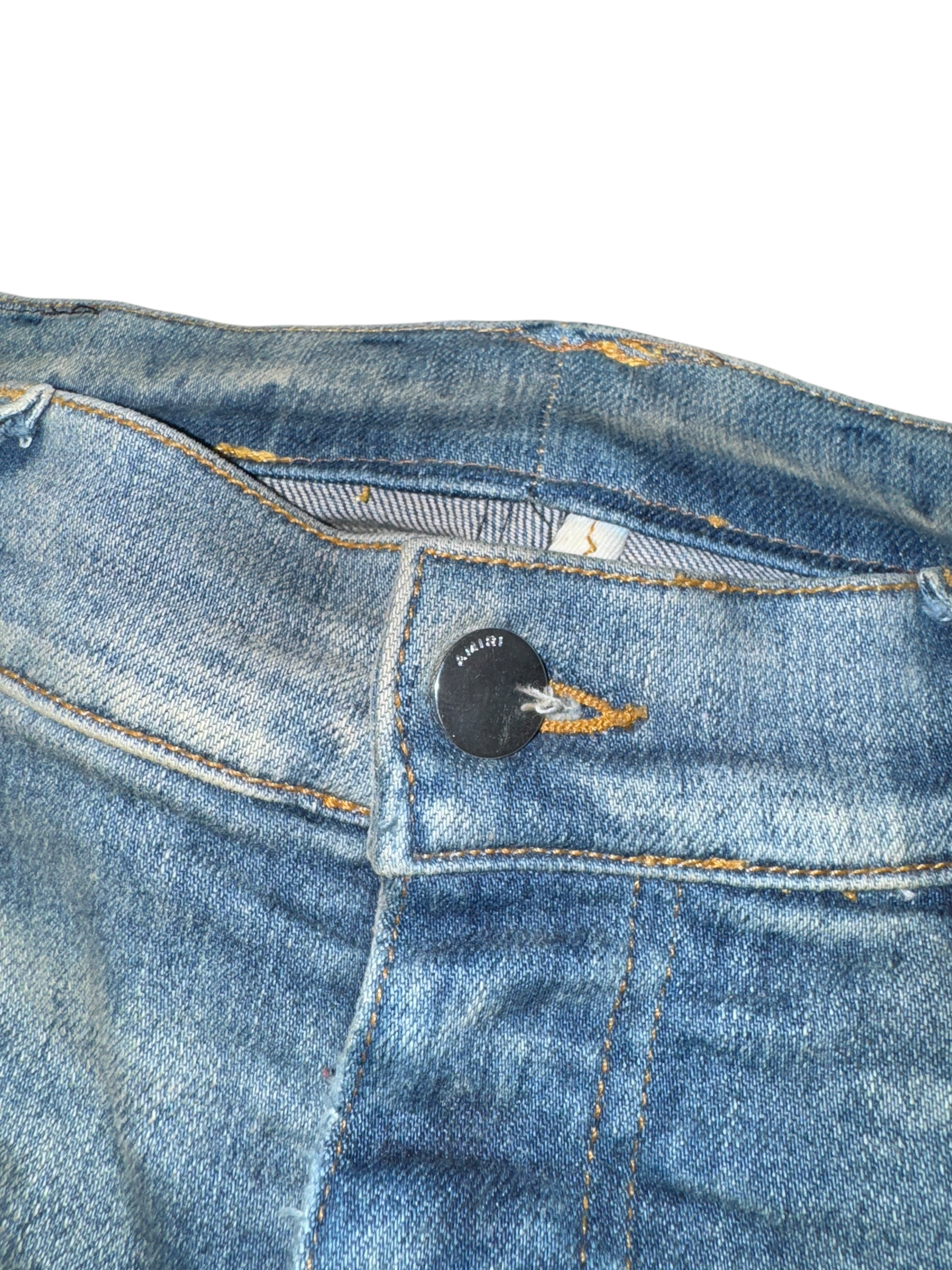 Amiri MX1 Light Wash Boucle Patch Jeans