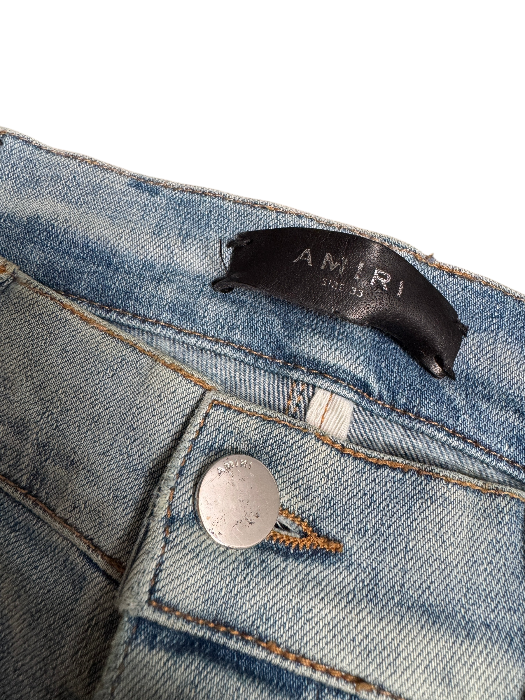 Amiri MX1 Light Wash Black Patch Jeans