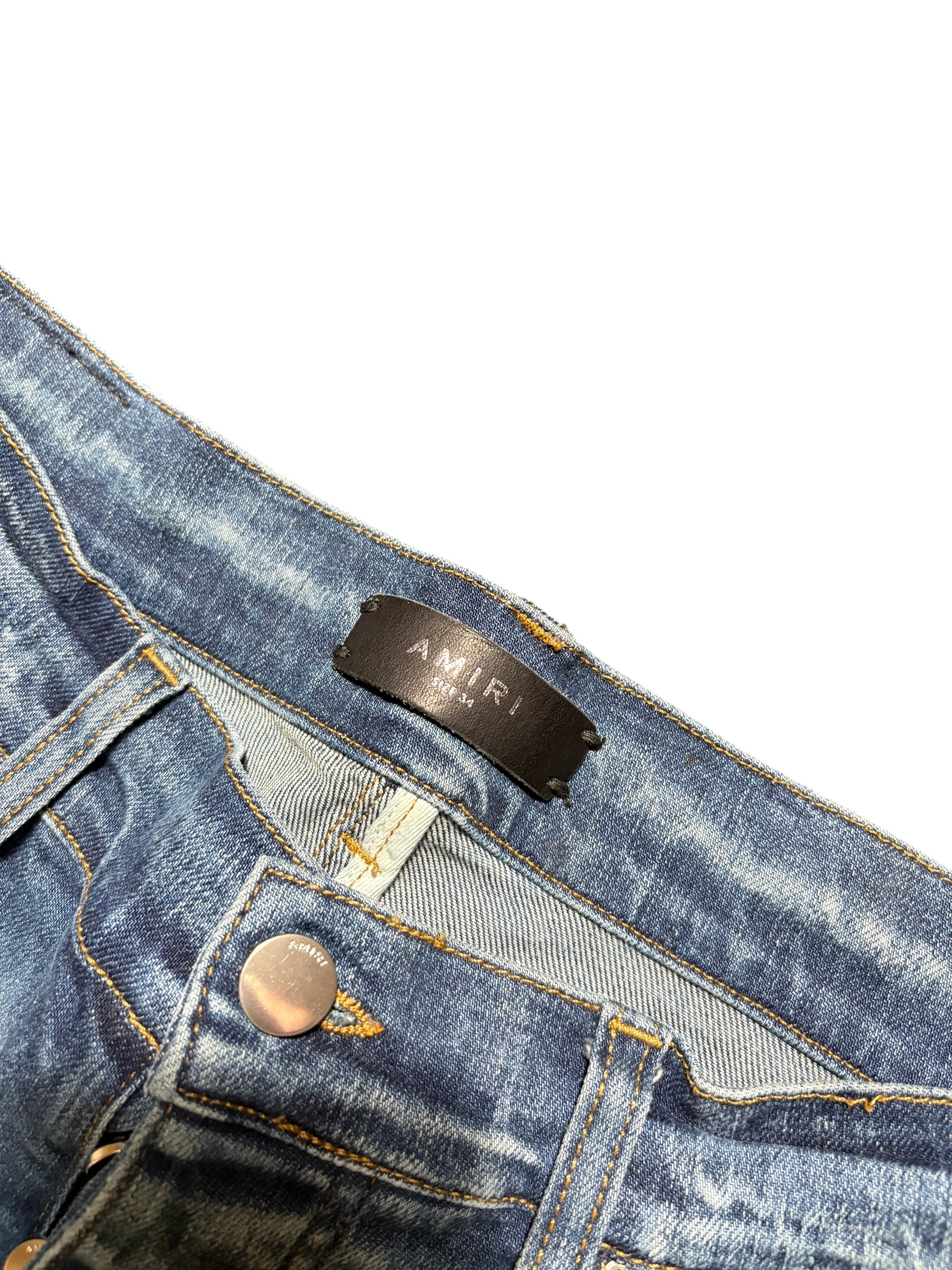 Amiri MX1 LightWash Black Patch Jeans